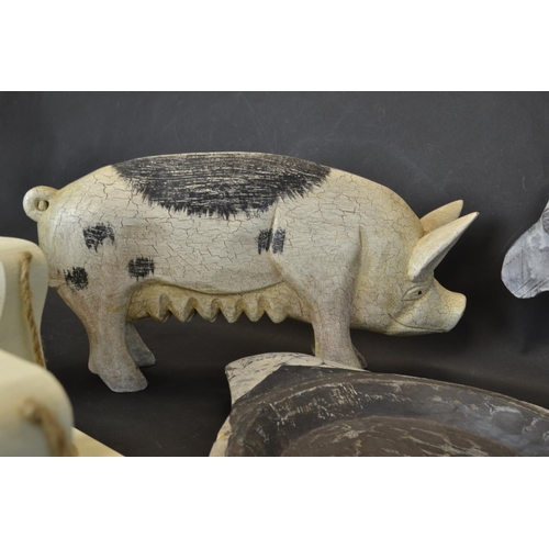 340 - Collection of wooden animal ornaments. Length of Pig 41cm