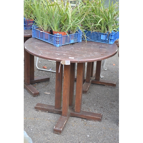 103 - Circular wooden garden table, 85cm diameter, wear to varnish