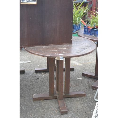105 - Circular wooden garden table, 85cm diameter, wear to varnish
