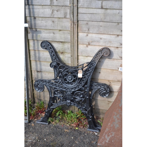 34 - Pair of black painted cast metal bench ends