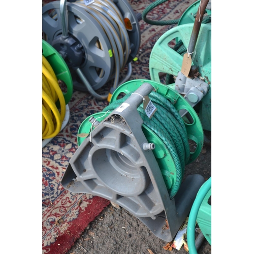 56 - Green hose on reel