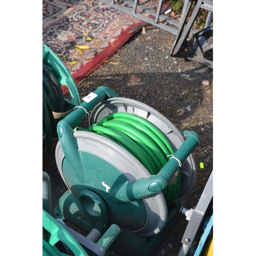 58 - Green hose on reel