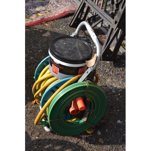 59 - Yellow hose on reel with attachements