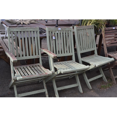 87 - 3 green painted folding chairs, some wobbles