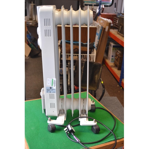 120 - Small Oil filled radiator. Tested in full working order.