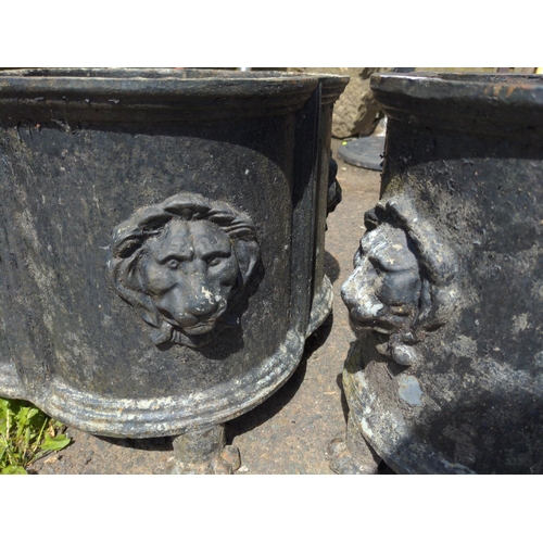 4 - Pair of Victorian clover leaf cast iron garden urn planters. With lions head detail to corners and r... 