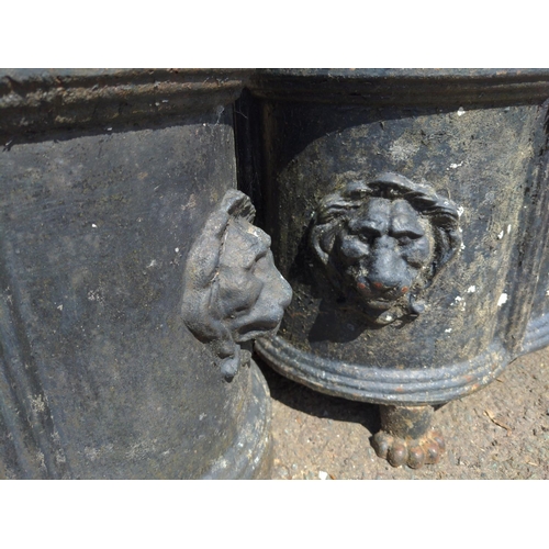 7 - Pair of Victorian clover leaf cast iron garden urn planters. With lions head detail to corners and r... 