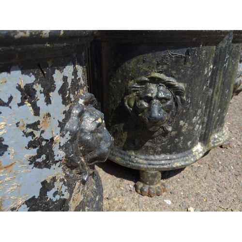 9 - Pair of Victorian clover leaf cast iron garden urn planters. With lions head detail to corners and r... 