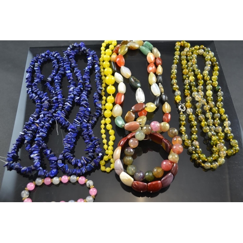 492 - Lapis lazuli, hardstone and amber coloured glass necklaces & 3 bracelets