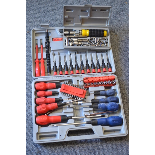 161 - Complete Phillips and flathead screwdriver set plus a boxed small socket set.