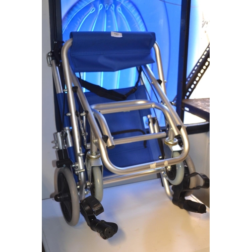 193 - Blue seated folding wheelchair