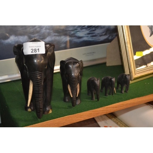 281 - Family of ebony elephants