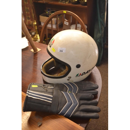 284 - Vintage AGV Daytona motorcycle helmet and motorcycle gloves.