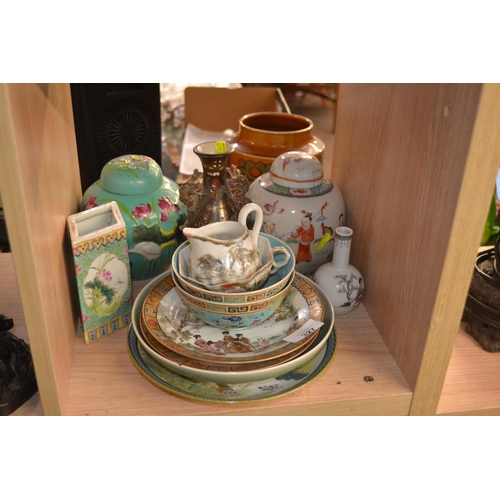 327 - Shelf of Oriental ceramic items inc. ginger jars. Some with areas of damage.