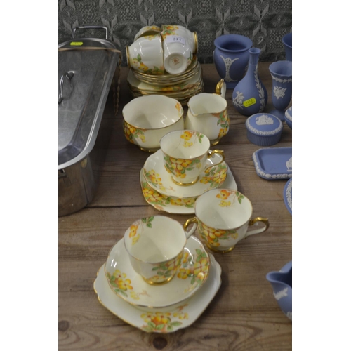 371 - Royal Albert Clematis pattern tea cups, saucers, milk jug, sugar bowl + plates. Some hairline cracks... 