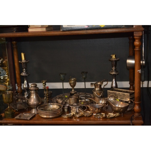 415 - Large qty of mostly silver plated items inc. Candlesticks, metal lemon slice squeezers etc.