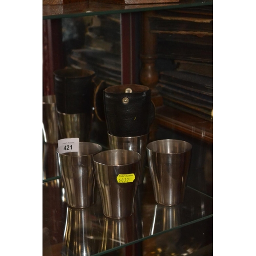 421 - 4 Danish stainless stirrup cups with leather case