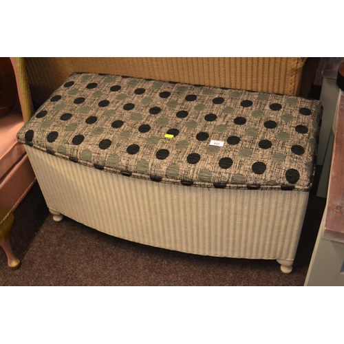 433 - Lloyd Loom ottoman with upholstered top. W90cm