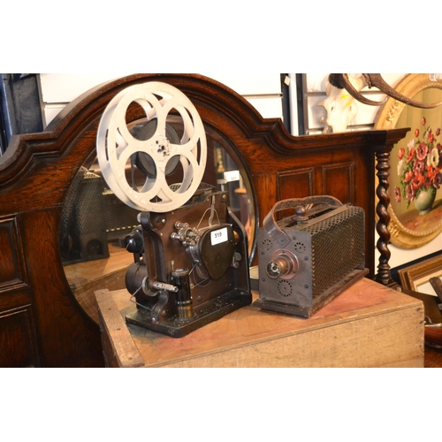 519 - Kodascope model C projector and light with film reels