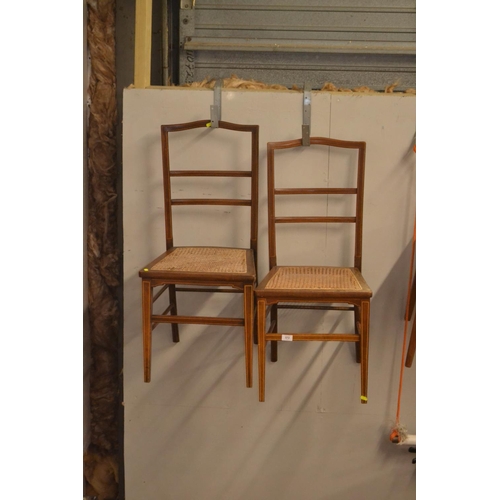 572 - Pair of inlay cane seated chairs