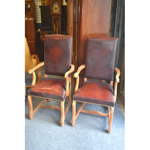 579 - Beech framed Leather upright carver chairs x 2