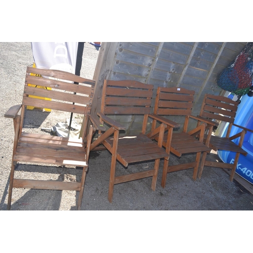 85 - 4 varnished pine folding garden chairs