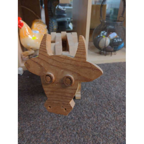 319 - Ceramic chicken & wooden cow