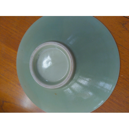 328 - Chinese celadon glazed bowl, 26cm diameter