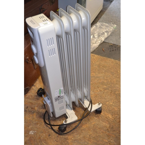 102 - Small Oil filled radiator. Tested in full working order.