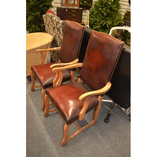 752 - Two beech framed leather upright carver chairs