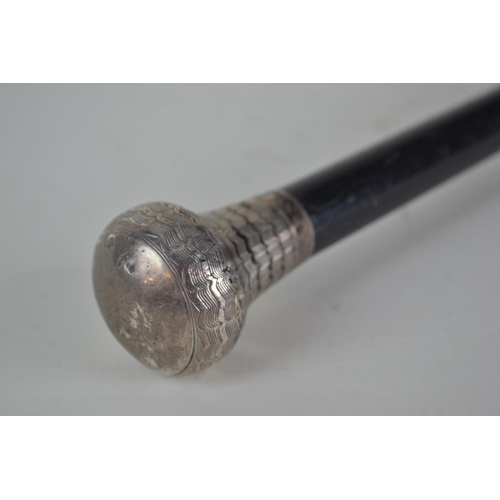 319 - HM silver topped ebony swagger stick, 84.5cm long