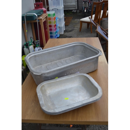 150 - 'Harris' aluminium fish/meat tray and 3 others. Largest 65cm long.