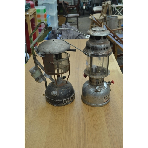 179 - 2 hurricane lamps, 1 with anchor mark