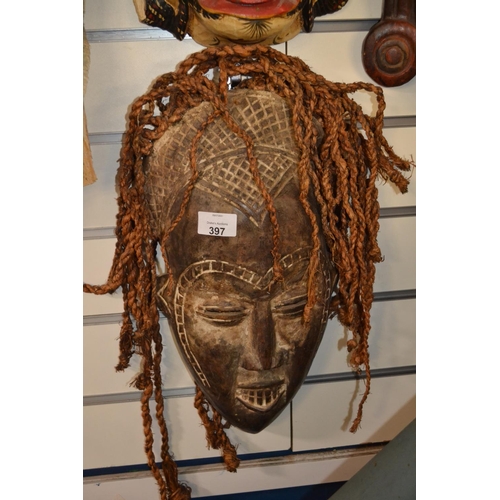 397 - large African mask with twine hair. 40cm high