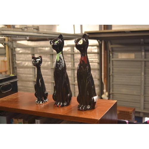 411 - 3x slender black cat figures, smaller cat modelled as a vase.