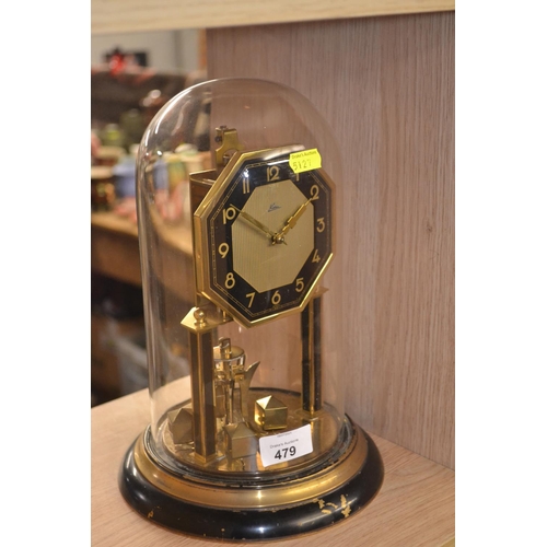 479 - German glass domed brass clock H28cm