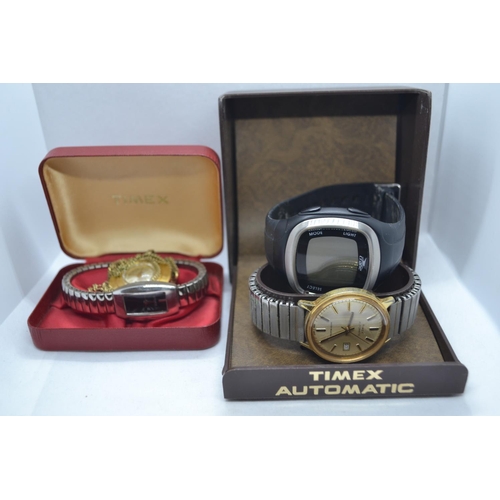 653 - 3x watches inc. one boxed Timex Automatic and a coin tray with old one penny pieces.