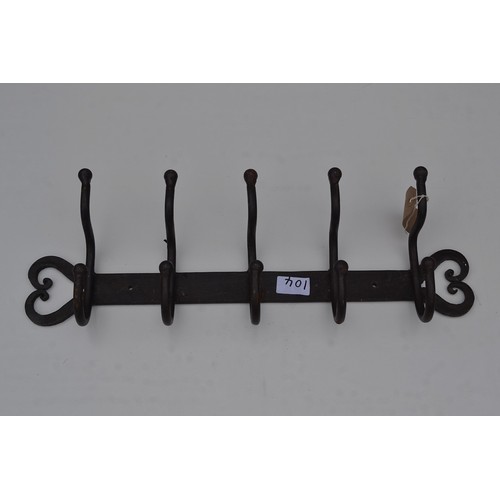 104 - Wrought iron coat hooks