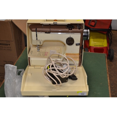 206 - Frister Rossmann CUB4 electric sewing machine with pedal etc.