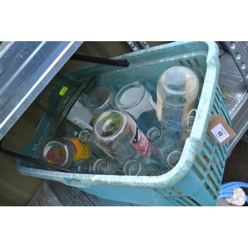 60 - Crate of vintage milk bottles with advertising