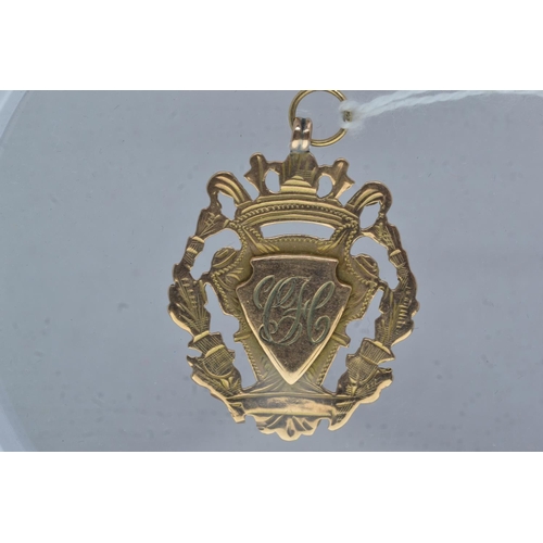 63 - 9ct gold medal, 6.35 grams