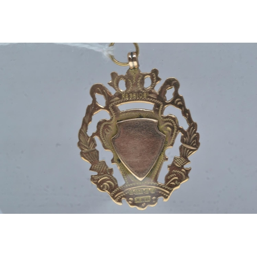 63 - 9ct gold medal, 6.35 grams