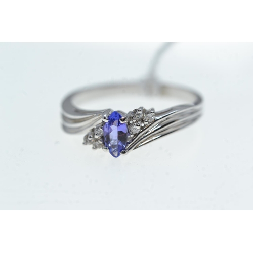 70 - 14ct white gold, tanzanite & diamond ring, size S, 3.34 grams