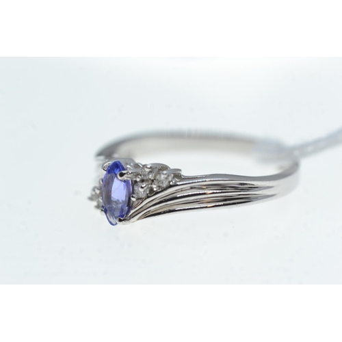 70 - 14ct white gold, tanzanite & diamond ring, size S, 3.34 grams