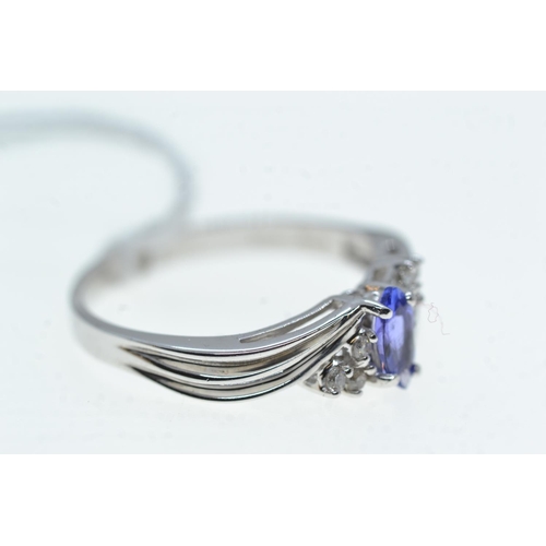70 - 14ct white gold, tanzanite & diamond ring, size S, 3.34 grams