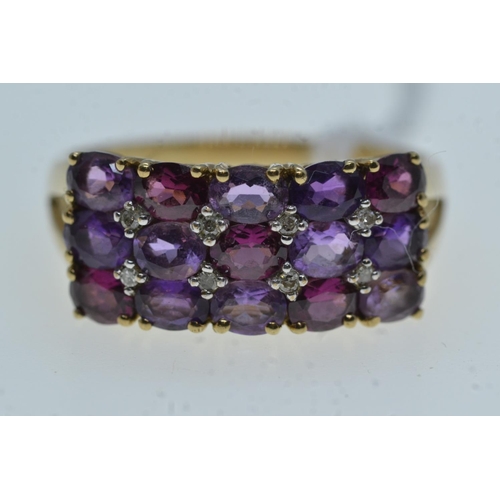 74 - 9ct gold, diamond & purple stone ring, size R, 3.6 grams