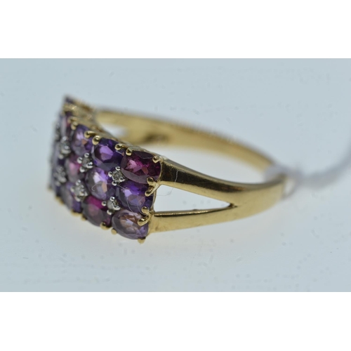 74 - 9ct gold, diamond & purple stone ring, size R, 3.6 grams