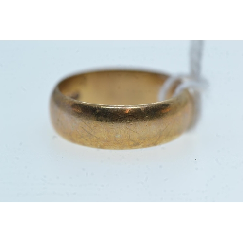79 - 9ct gold band, size J1/2, 3.42 grams