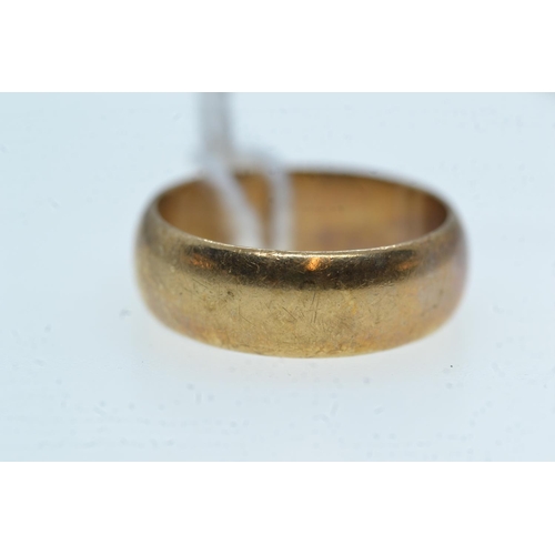 79 - 9ct gold band, size J1/2, 3.42 grams