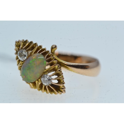 82 - Opal & diamond ring, mounted in yellow metal tested positive for 14ct gold, size I, 3.79 grams